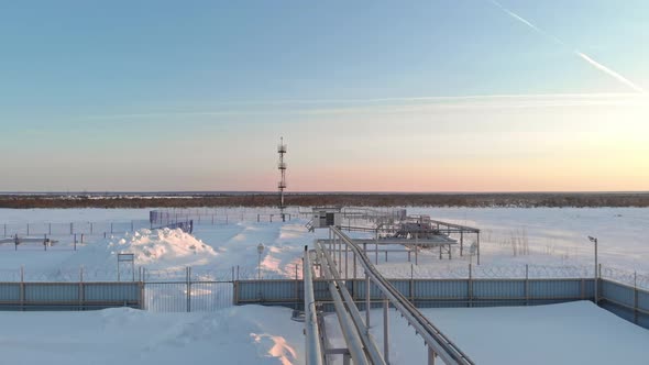 A Drone Flies Over a Pipeline a Gas Pipeline at an Oil and Gas Field in Siberia