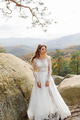 Beautiful bride in white dress posing. - PhotoDune Item for Sale