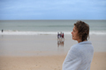 Portrait of woman in towel at the beach - PhotoDune Item for Sale