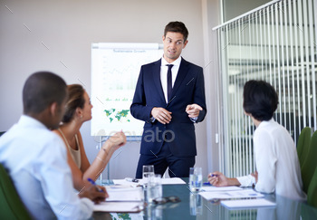 enting data during a boardroom meeting