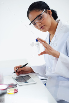e young female scientist working in her lab