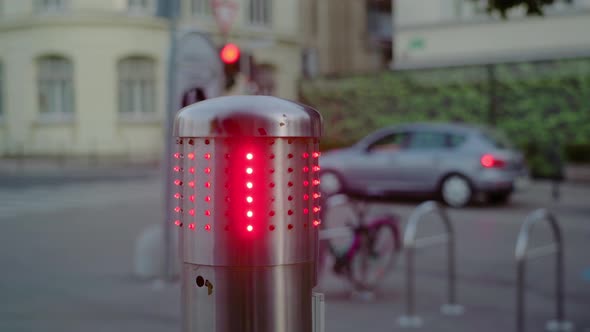 Stop Sign Located on Street of Ljubljana Flashes with Red