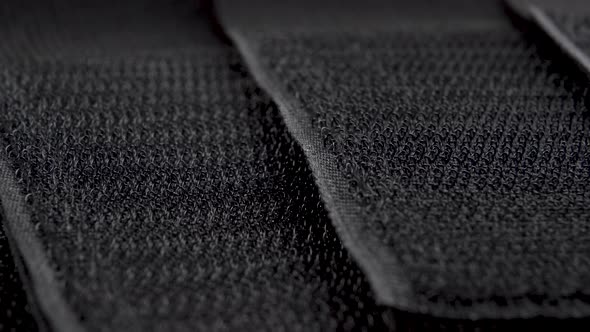 Velcro on black textile tapes close-up