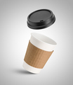White paper coffee cup and black lid in the air - PhotoDune Item for Sale