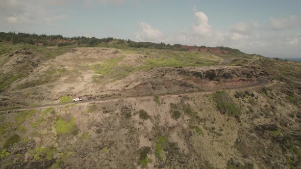 Exciting ridges and roadways provide exciting driving conditions in Maui, Hawaii.  This clip ads to