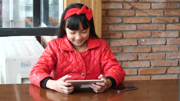 Little Girl Happy With Tablet