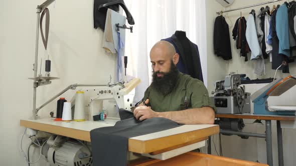 Tailor sewing pants