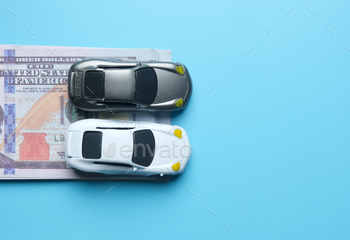 ke cash on copyspace blue background. Car purchase deal concept.