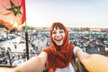 Happy tourist visiting Jamaa el-Fna market, Morocco  - PhotoDune Item for Sale