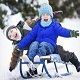 Children Sledding in Outdoor