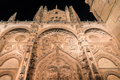 View of the University of Salamanca illuminated at night. Low angle view of Plateresque main facade - PhotoDune Item for Sale