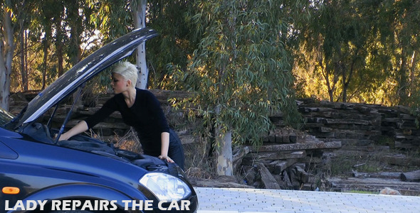 Lady Repairs The Car alt