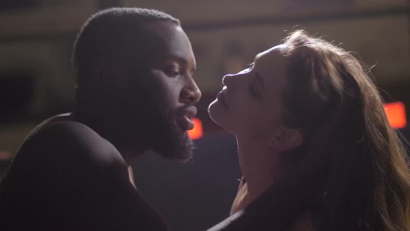 Closeup of Passionate Man Kissing Woman's Neck