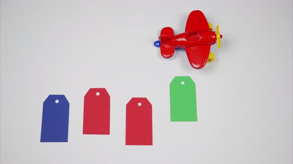 Toy Plane Throws Blank Price Tags. Stop Motion Animation 