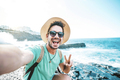 Handsome young man taking selfie portrait on summer vacation - PhotoDune Item for Sale