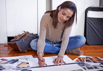 rking on her portfolio at home