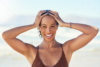 ful young woman spending the day at the beach