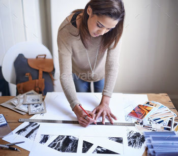 ung woman working on her portfolio at home