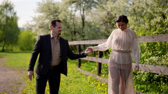 Romantic Walk of Two Loving People in Nature in Summer Day Happy Woman and Her Husband