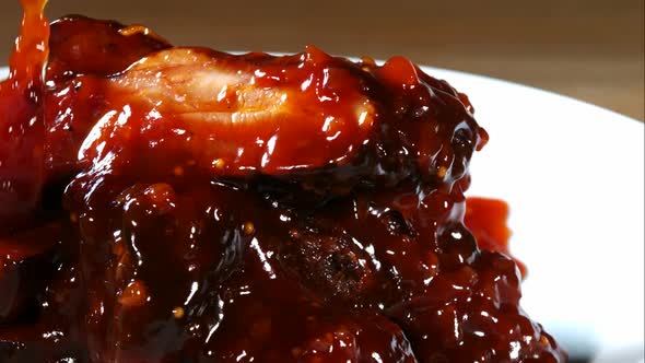 BBQ sauce pouring and splashing in ultra slow motion 1500fps onto BBQ ribs - BBQ PHANTOM 079