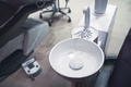 dental white ceramic spit sink near chair in dentist office - PhotoDune Item for Sale