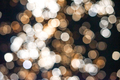 Golden glittering Christmas bokeh lights out of focus at night.  - PhotoDune Item for Sale