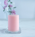 unlit pink candle on floral background - PhotoDune Item for Sale