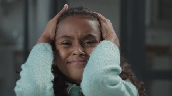 Frustrated Little Girl Holding Hands on Head