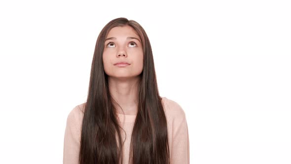 Portrait of Attractive European Lady Rolling Her Eyes Feeling Boredom and Disinterest Posing Over