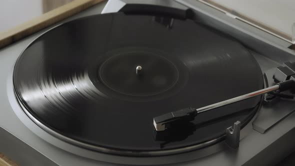 Modern Vinyl Turntable Playing at Home