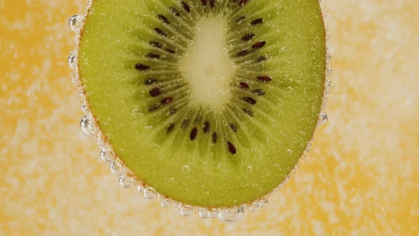 Kiwi Slice on Yellow Background