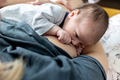 Mom breastfeeding her little baby - PhotoDune Item for Sale