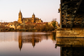 Scenic view of Salamanca with the Cathedral and iron bridge reflected in the Tormes River at sunset - PhotoDune Item for Sale