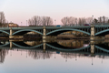 Enrique Estevan Iron Bridge reflected on the Tormes River at sunset - PhotoDune Item for Sale