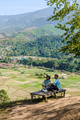A couple of men and women on vacation in Northern Thailand Nan Province visiting the Sapan Valley - PhotoDune Item for Sale