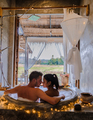 A couple of men and women in a bathtub in a homestay in Northern Thailand  - PhotoDune Item for Sale