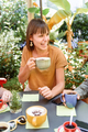 Happy woman drinking coffee with friends - PhotoDune Item for Sale