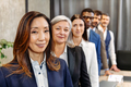 Multiracial businesspeople standing in row - PhotoDune Item for Sale