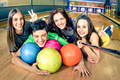 Best friends using selfie stick taking pic on bowling track - PhotoDune Item for Sale