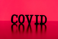 COVID backlit by red background - PhotoDune Item for Sale
