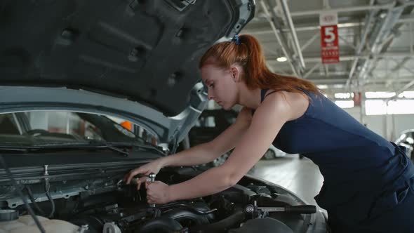 Woman in Car Mechanic Industry