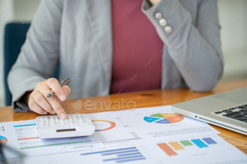 ts Invoice and pressing calculator buttons over documents. Accounting Bookkeeper Clerk Bank Advisor And Auditor Concept.