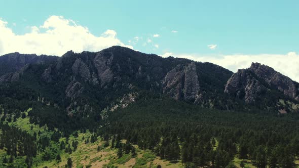 Dramatic Mountain Vistas, Light Blue Sky, Dolly Aerial Shot Colorado