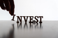 INVEST spelled out in silhouette - PhotoDune Item for Sale