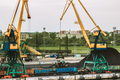 Railway Carriages Loaded Coal. Machines, Mechanisms. Loading Station Tower Cranes. Coal Wagons - PhotoDune Item for Sale