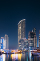 Night view Of Dubai Marina Towers. Yachts Moored Near City Pier, Jetty In Evening Night - PhotoDune Item for Sale