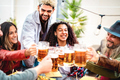 Young happy friends drinking and toasting beer at brewery bar - PhotoDune Item for Sale