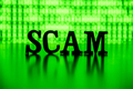 SCAM spelled out backlit by green - PhotoDune Item for Sale