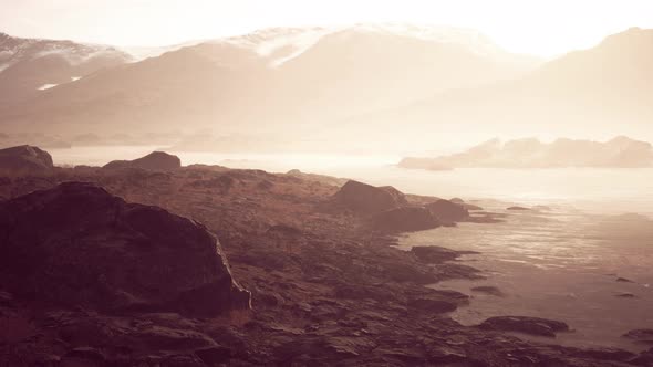 Atmospheric Landscape with Mountain Lake Among Moraines in Rainy Weather