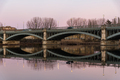 Enrique Estevan Iron Bridge reflected on the Tormes River at sunset - PhotoDune Item for Sale